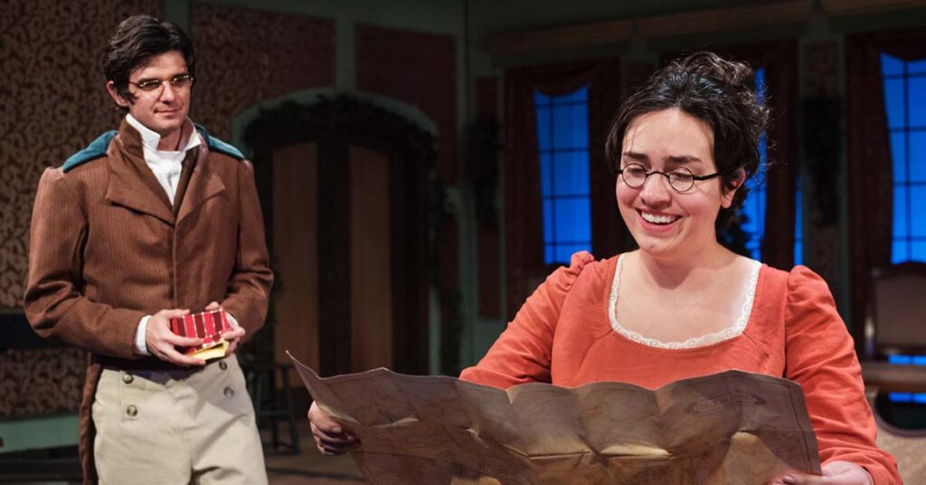 [image: James Lewis and Melinda Marks smiling over a Christmas gift]