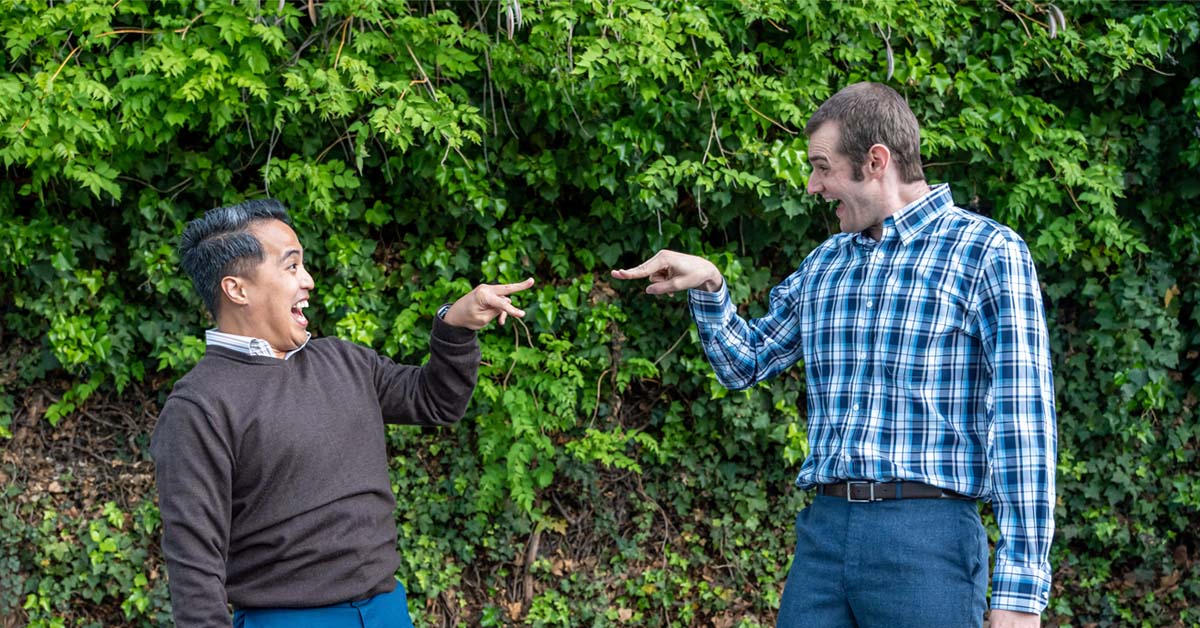 [image: Actors Wes Gabrillo and Max Tachis pointing at each other and laughing]